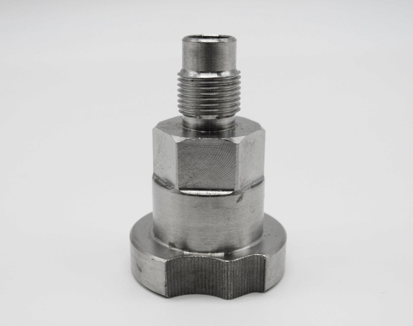 Close-up of PPS spray gun adapter for SATA models – ADP09 with threaded tip