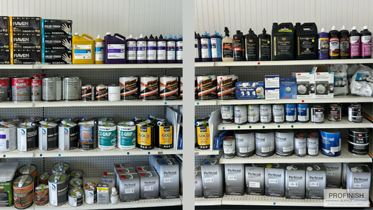 Shelves stocked with automotive and industrial refinishing products including primers, fillers, hardeners, and surface prep materials from brands like Raven, U-POL, Evercoat, and Z-GRIP at ProFinish Supply in West Palm Beach