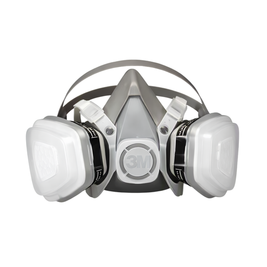 A 3M half-face respirator mask with two white filter canisters attached to the sides, shown against a plain white background.