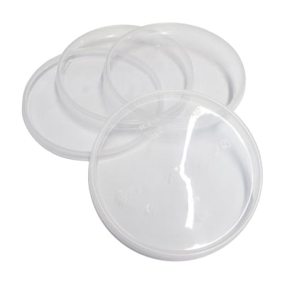 Clear plastic lids for Advantage mixing cups, circular and transparent, arranged in a stack with light reflections showing surface details.